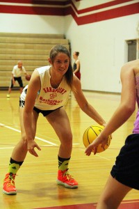 Breylnn Converse, pictured here coaching a children's basketball camp at the Sandpoint High School gymnasium, is one of many high school students honored as this year's Fourth of July parade grand marshall. Photo by Ben Olson.