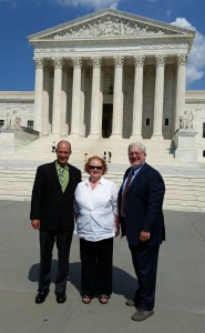 Brad Carlson, Kate McAllister and Phil Hough in front of the Supreme Court in Wash., D.C.
