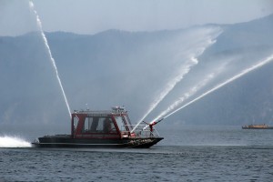The Timberlake Fire Boat demonstrating the spraying capability off shore from Bayview. Photo by Ben Olson.