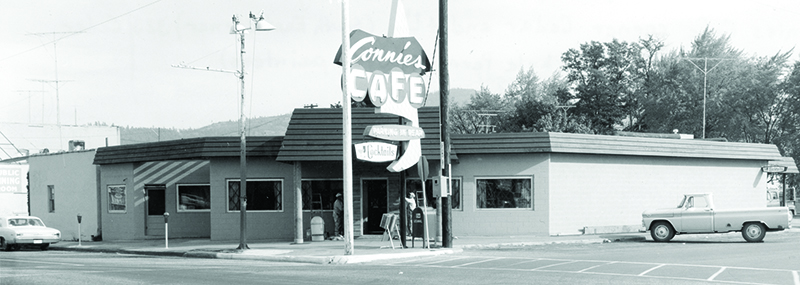 Connie’s Cafe, sometime in the 1960s. Note the front of the cafe used to be beveled and didn’t meet the streetcorner like the current cafe is. The front booths today are located in what used to be the sidewalk. Photo courtesy of the Bonner County History Museum.