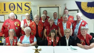 The Lions Club members. Back row (left to right): Sandpoint Chapter President Dave Bannister and Bill Lewis. Next row (left to right): George VanRossum, Wayne Henderson, Keith Leiber, and Tom Debrowski. Front standing row (left to right): Mike Reeb, Judy Debrowsky, Mary Leiber, and June Dull. Seated row (left to right): Claudia Bannister, Sandy VanRossum, Barbara Trudeau, Past Zone Chair Pat Nelson from Priest Lake, and Nancy Lewis. Photo courtesy of the Sandpoint Lions Club.