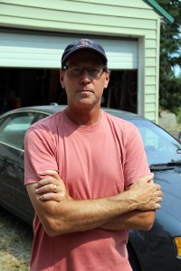 Evacuee Tim Karrigan returns to his home Thursday morning. Photo by Ben Olson.