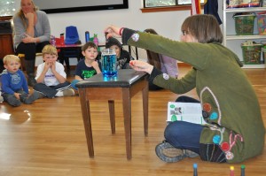 Parent volunteer Mandi Conway provides Sandpoint Acadamy of the Arts students a lesson in color blending in a class Wednesday morning. Photo by Cameron Rasmusson.