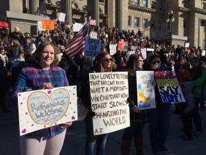 Left to right: Amanda Earley and Megan Freeman came to the Idaho State Capitol to show solidarity with refugees. Photo by Harrison Berry, used by permission by the Boise Weekly.
