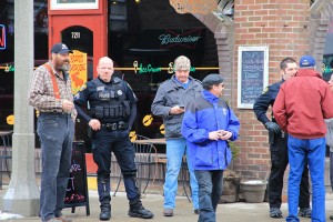 There was a police presence during the rally, but feelings were mostly civil, except for a few outburst from the protesters. Photo by Ben Olson.