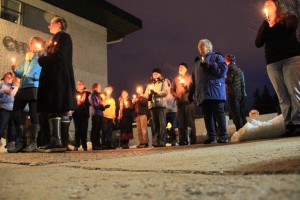 A candlelight vigil held by the Bonner County Human Rights Task Force greeted those coming and going from City Hall at Wednesday's council meeting. Photo by Ben Olson.