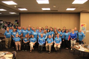 Members of the Wednesday Sandpoint Rotary Club meeting wear blue in support of World Autism Awareness Day, which falls on April 2. Photo by Ben Olson.