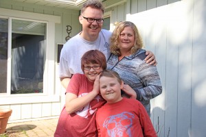 Karl and Tiffany Dye (back row) with Hattie (left) and Henry (right). Photo by Ben Olson.