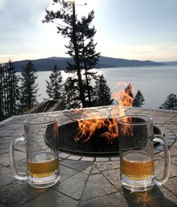The outdoor fire feature that makes a great place to hang out and sip on a few cold ones in front of the lake.