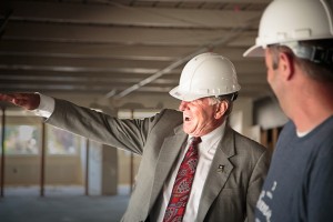 Charles Manning, right, gives Gov. C.L. “Butch” Otter a tour of the new Kochava facility in Sandpoint last Monday. Photo by Alan Barber.