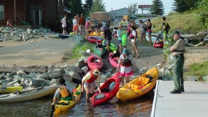 Kayak support vessels congregate at the south end of the Long Bridge at 2010’s Long Bridge Swim. Photo by Sean Haynes.