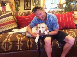 Meadowbrook owner Eric Blomdahl gives a little love to Drake.