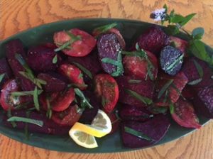 This salad is especially pretty using red, yellow and orange tomatoes and red and golden beets. Nice side with grilled salmon or lamb.