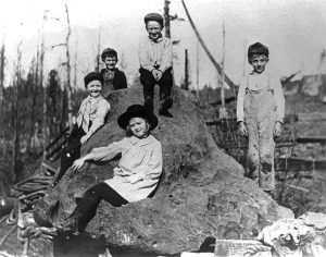 Five kids sit on the famed meteorite. Photo courtesy of Jack Nisbet.