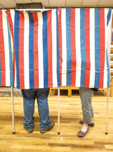 Voters cast their ballots at Sandpoint Community Hall on Tuesday. Photo by Cameron Barnes.