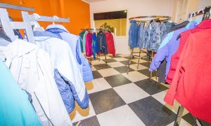Recently donated coats line the Coats 4 Kids display room at the Bonner Mall in Ponderay, which will be the location of the KXLY weather broadcast and distribution day on Oct. 26. Photo by Cameron Barnes.