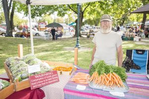 Ron Kilgore - Muskrat Hill Farm: Years at the Farmers Market: six “Sales have been increasing every year since we started. Every year is different. This year we had to deal with the aftermath of a very mild winter with unusually warm temperatures very early in the spring followed by a return to colder weather. The mild winter meant no winter kill for a lot of pests. They survived and were hungry and ready to go when things warmed up. The hot-cold cycle also caused early bolting in a lot of our crops.” Photo by Cameron Barnes