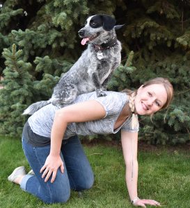 Rosie shows off her special trick with owner Lindsey Simler. Photo by Chris Bessler.