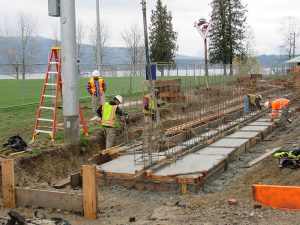 Supervisor Reynolds inspects work done by Monster Concrete. Photo by Cort Gifford.