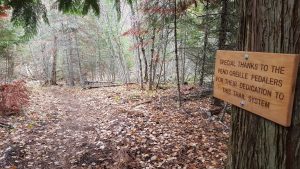A commemorative plaque thanking POP for their trail work on Lost Lake Trail System. Photo by Steve Sanchez.