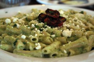 Top: Papardelle con Pesto with gluten-free rice Penne noodles. Photo by Jules Fox.