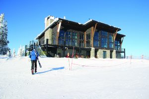 A skier makes his way to the Sky House on Friday. Photo by Ben Olson.