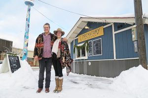 Understory Coffee co-owners Evan Metz and Johnelle Fifer stand by their newly acquired coffee hut on Second Ave. and Cedar St. Photo by Ben Olson.