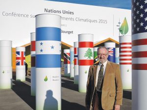 Gary Payton standing in front of the COP21 hall in Paris in Dec. 2015. Courtesy photo.